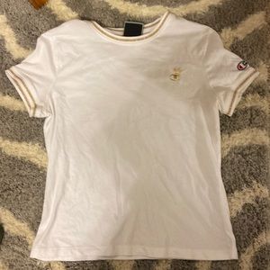 Champion T-Shirt with gold, on neck and arm sleeves. No stains. Youth Large